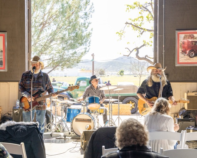 The event included a raffle, live music, and food. Guests were offered a complimentary color bandana of their choice upon entry to match the agricultural theme.