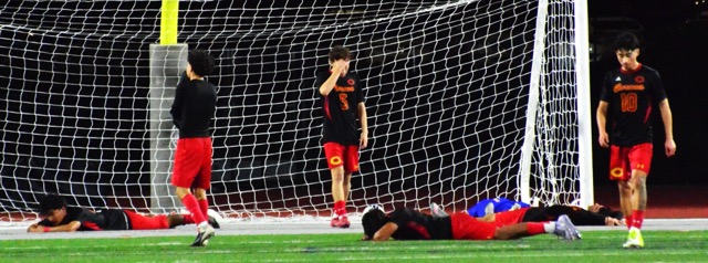 Corona goalie Chris Salazar and five Panther defenders collapsed in anguish following Canyon’s game-winning goal, the game’s only score, eight minutes into OT.
