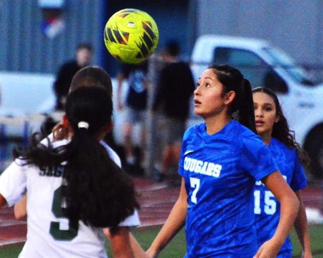 Norco’s Scarlett Rivera (7) eyes the ball while teammate Toni Backus (15) comes up to support and Sage Hill’s Sydney Patel (9) surveys the play. The Lightning defeated the Cougars 4 – 0 in the first round of the CIF playoffs.