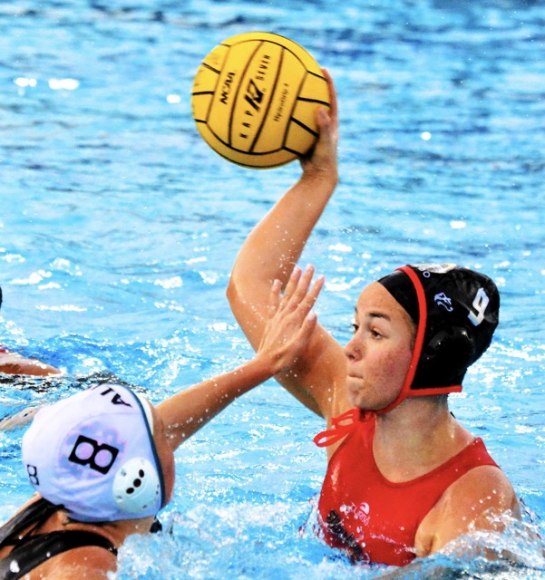 Centennial’s Emma Armstrong (9) fires in a scoring shot against Aliso Niguel’s Shellby Cooney (8). Credit: Photo by Gary Evans