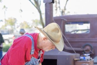 A demonstration of iron working at the Tools That Built America exhibition opening at the Perris Valley Historical Museum. Credit: Lisa Zambrano. Tools That Built America