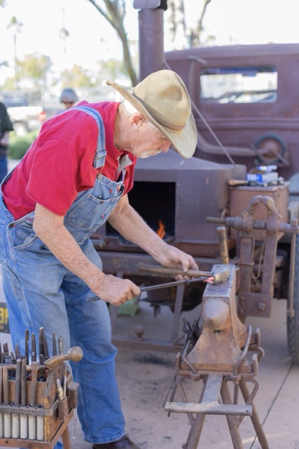 A demonstration of iron working at the Tools That Built America exhibition opening at the Perris Valley Historical Museum. Credit: Lisa Zambrano. Tools That Built America
