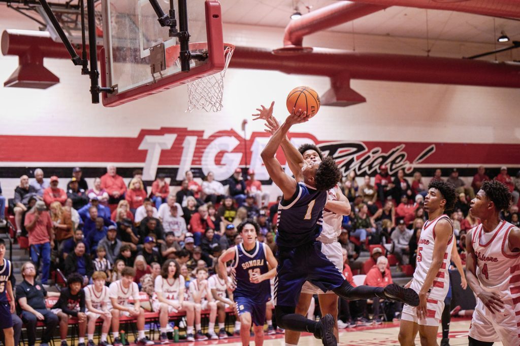 Sonora’s #1 Jayden Barnes converts the contested lay up