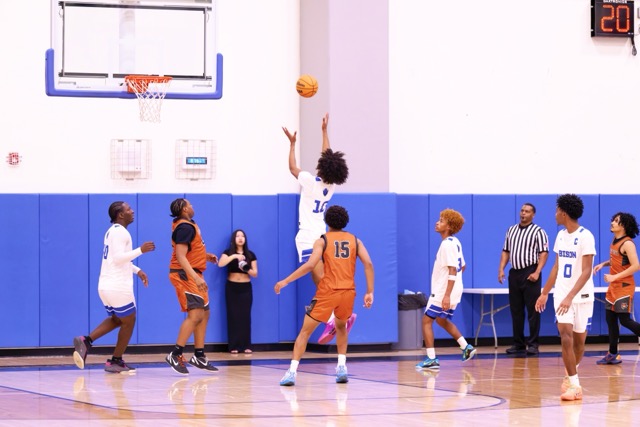 Liberty’s #10 elevates above the defense to sink the easy floater