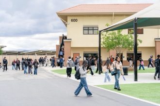 Students walk to class at Orange Vista High School.  Credit: Photo by Kyle Grillot for CalMatters