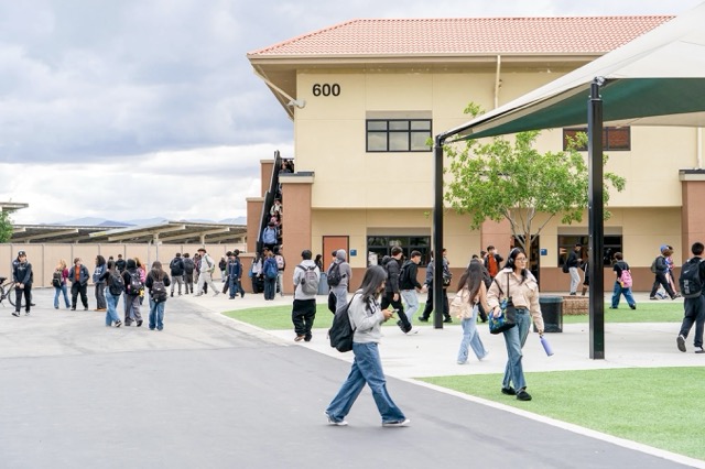 Students walk to class at Orange Vista High School.  Credit: Photo by Kyle Grillot for CalMatters
