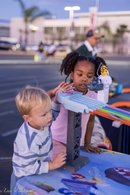 : Billy Smith, right, plays with the hot wheels track at the Foodie Friday event on the campus of Mount San Jacinto Menifee Campus last Friday. The event featured food vendors, live music, and games and toys for kids.