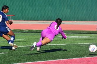 Eastvale Roosevelt’s Harsha Subramanian (10) forced Newport Harbor goalie Aliyah Chappell (0) to deflect the ball wide. Subramanian regained control and put in a deft left foot, open net shot, the contest’s lone goal. It’s the second D1 title for Roosevelt in three years. On Tuesday, in the first round of the regionals, the Mustangs fought top-ranked Santa Margarita to a 2-all tie in regulation, but their season ended on penalty kicks.