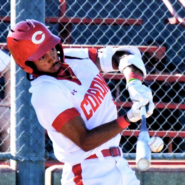 Corona’s Anthony Murphy hits a two-run home run during his second at-bat on the way to hitting for the cycle during the Panthers 8 – 3 victory over the Wolves. Photo by Gary Evans