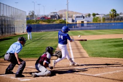 Matthew Schaeffer (#14) rips a ball foul