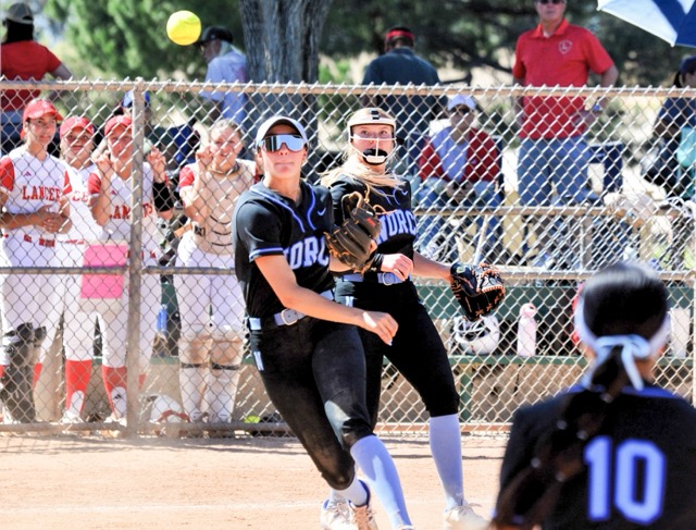 Norco third baseman Sadie Burroughs snares a line drive for the out in the Cougars 2 – 0 win over Orange Lutheran.