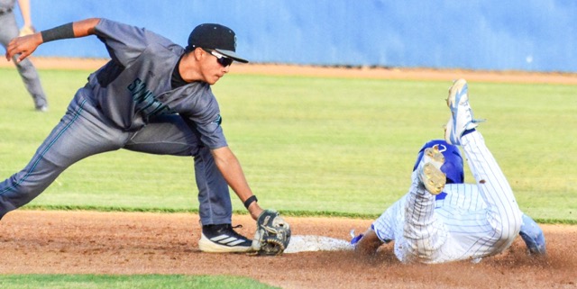 Santiago shortstop Jayden Ramirez (left) appears to be late on the tag of Norco’s Dylan Seward (right) on a steal attempt. Seward’s momentum took him past the bag, and Ramirez kept the tag applied for a called out.