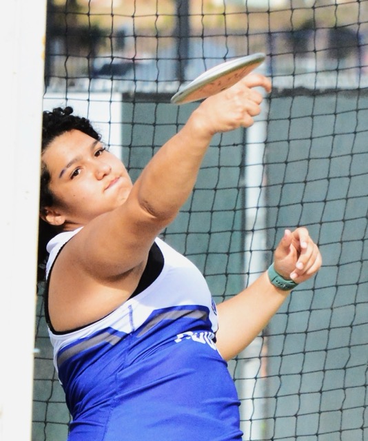 Norco’s Arianna Chaney tosses the discus during the track meet at Roosevelt.  Chaney took first place. 