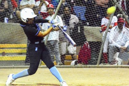 Norco’s Angelina Gonzales launches her second home run of the game against Fullerton in the Michelle Carew Tournament championship game. Gonzales led the Cougars to a 7 – 0 victory that avenged an earlier loss to the RedHawks in an Arizona tourney.