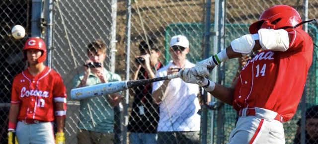 Corona’s Anthony Murphy (14) blasts a 3-run homer in the top of the second inning, helping propel the Panthers to an 8 – 3 victory over the Santiago Sharks in the rubber game of the league series. Santiago took the opener 6-2, and the Panthers the middle game, 9-7.
