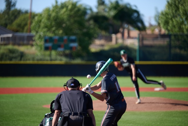 Coyotes #19 Chase Entrikin holds up on a swing and takes an off speed pitch for a ball