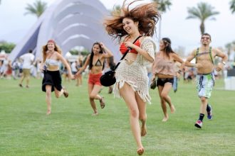 Music Festival Season. Festivalgoers run toward the main stage at the Coachella Valley Music and Arts Festival in Indio, Calif., on April 13, 2012.  Credit: AP Photo/Chris Pizzello