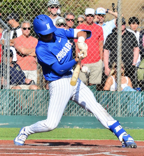Norco’s Codey Brown smacks a bases-loaded line drive into centerfield, scoring Jayden Serna from third. The throw home was high, allowing Elijah Alvarez to slide home safe and give the Cougars a 3 – 0 CIF Division 1 quarterfinal victory over Orange Lutheran.