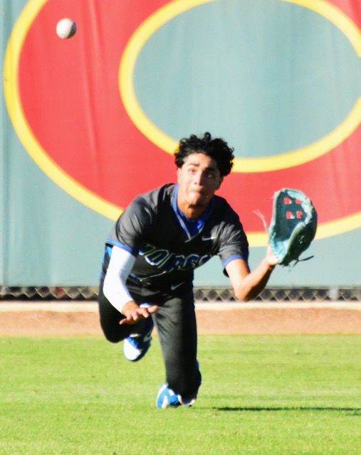 Norco outfielder Elijah Alvarez makes a diving catch against Corona during the Panthers 6 – 4 victory over the Cougars in the first of a three-game series.