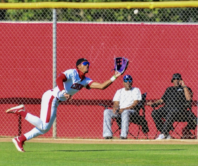 Corona centerfielder Anthony Murphy makes a spectacular catch against Norco in Monday’s game. The teams meet again today, Friday, and Norco has a league game VS King on Monday. One Cougar win will clinch the league title outright. Two Norco losses would create a shared title with Corona.