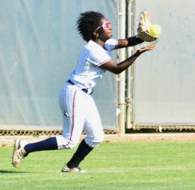 Eastvale Roosevelt’s Alexis Willis makes a running catch.