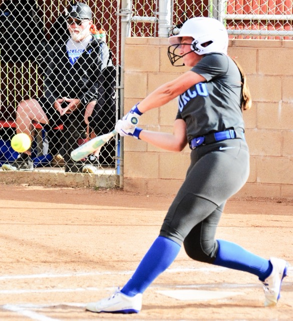Norco’s Annabel Sherman blasts a two-run home run to left field during the Cougars 12 – 1 victory over Corona. The co-top seed with Murrieta Mesa, Norco hosts Marina today at 3:15 in the first round of the CIF Division 1 playoffs.