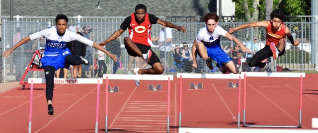 Norco’s Kadyn Camacho, Corona’s Christian Rios, Norco’s Jesse Diaz, and Corona’s Jesse Gonzalez race in the 300 Hurdles. Diaz took first at 45.37, Rios second at 46.83, Camacho third at 47.26, and Gonzalez fourth at 49.02.
