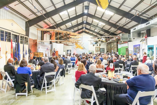 MilVet Celebrates 10 Years. The venue had 27 tables with eight seats at each table. Participants who had served were given a red, white, and blue sticker that read veteran. Credit: Photo by Lisa Zambrano