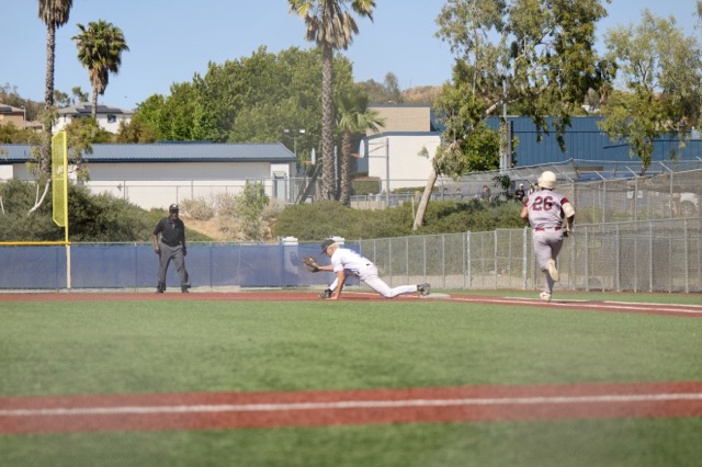 Riverside Prep #26 Nate Martinez runs to first. Temescal Canyon #9 Anthony Deleon stretches for the out