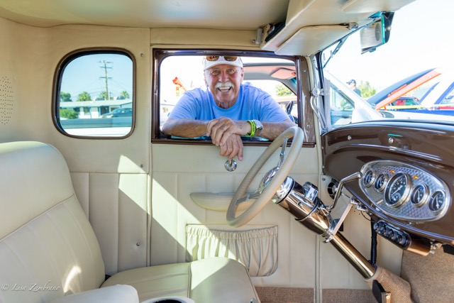 Rick Kalisz poses with his 1932 Ford Coup-five windows.