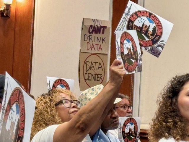 The signs passed out showed Perris’s emblem edited to say “No Data Centers In Perris.”
Credit: Photo by Mia Rotell