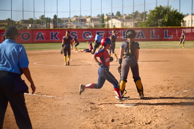 The Great Oak Wolfpack beat the El Capitan Vaqueros, 9-4 at home in the first round of the Division II CIF SoCal Softball Regional Playoffs on Tuesday June 2. They take on Garces Memorial today at home, 4 p.m. Great Oak scores as the batter slides into second on an RBI double. 