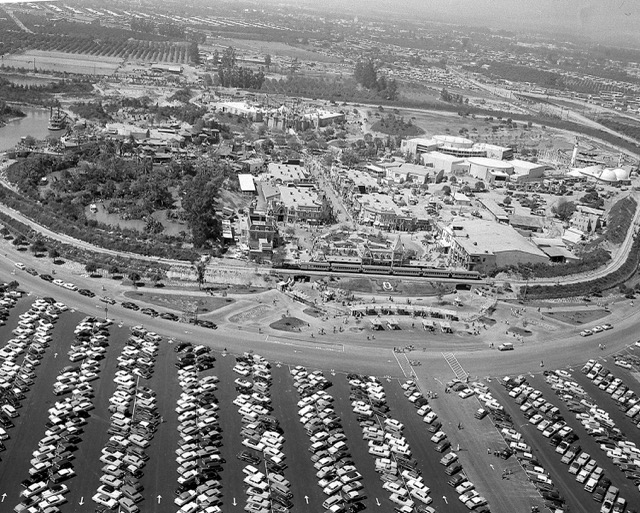 July 17. This aerial view shows Disneyland as 22,000 invited guests attend opening day festivities of the amusement park in Anaheim, Ca., on July 17, 1955. The 160-acre theme park, built on an orange grove, opened to the public July 18. Credit: AP Photo