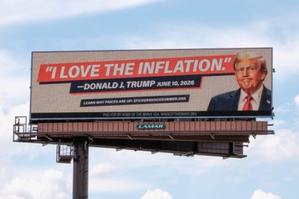 US Inflation. An electronic billboard with an image of President Donald Trump reads "I love the inflation." - Donald J. Trump June 10, 2026," is seen near I-74 in Cincinnati, Tuesday, June 16, 2026.  Credit: AP Photo/Carolyn Kaste