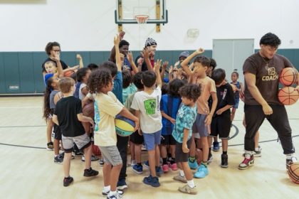 Campers and coaches break at the end of a fun day at the Menifee Gym Free Summer Basketball Camp, July 15. Photo by Lisa Zambrano