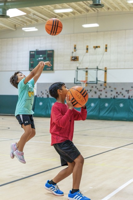 Campers take shot at the basket at the Menifee Gym Free Summer Basketball Camp, July 15. Photo by Lisa Zambrano