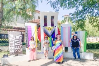 Ashley Williamson stands in front of the rest of the P.R.I.D.E. Perris Pride members before Vargas presented them with the official proclamation.  Credit: Photo by Mia Rotell