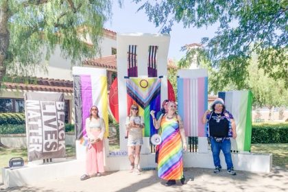 Ashley Williamson stands in front of the rest of the P.R.I.D.E. Perris Pride members before Vargas presented them with the official proclamation.  Credit: Photo by Mia Rotell