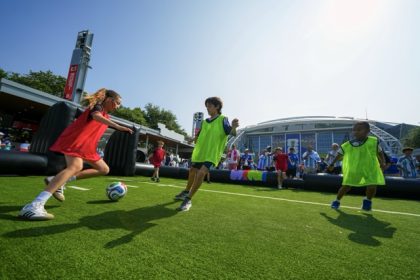 Children wearing shirts of Austria and Argentina play soccer outside the stadium before the World Cup Group J soccer match between Argentina and Austria in Arlington, Texas, near Dallas, Monday, June 22, 2026.  Credit: AP Photo/Julio Cortez