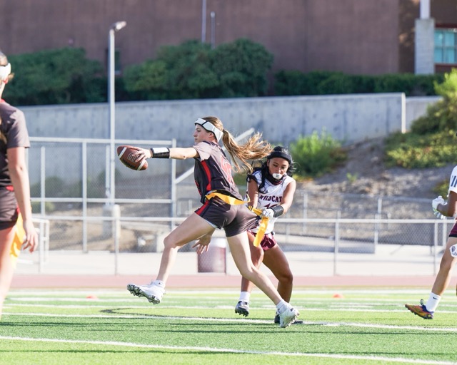 Paloma Valley’s #16, Paige Barron, pulls the flag of Murrieta Valley’s #40 during a nonleague girls flag football game