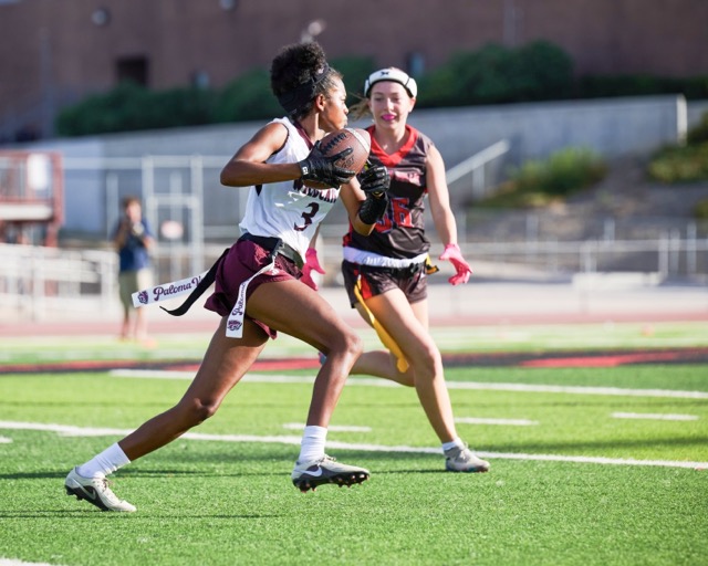 Paloma Valley’s #3 Cadyn Evans turns upfield with the ball as a Murrieta Valley defender pursues