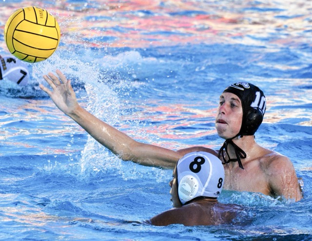 Corona’s Zach Bonnera (10) fires a shot on goal while Schurr’s Cuauhtli Dominguez (8) defends. The Panthers defeated the Spartans 14 – 4.