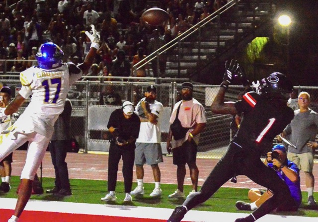 Rancho Santa Margarita defender Rayshawn Brandon (17) just misses deflecting Corona Centennial QB Jaden Jefferson’s touchdown pass to Quentin Hale (1). The Eagles nipped the Huskies 21 – 20 in a rematch of last season’s CIF Division 1 Championship game won by Rancho 42 – 7.