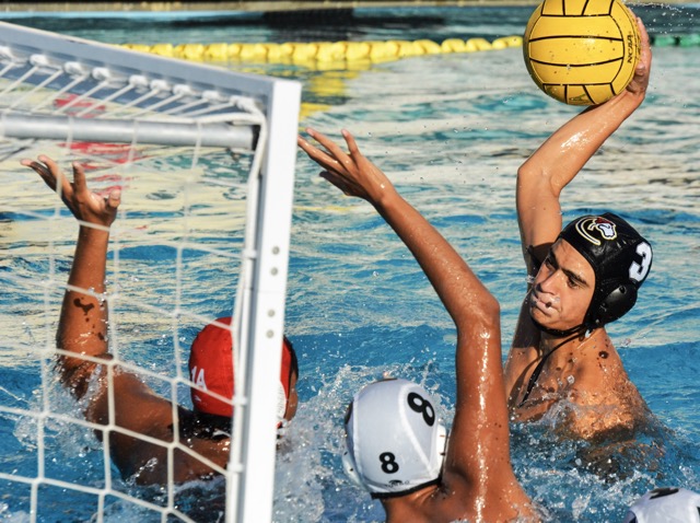 Corona’s Michael Burke (3) is about to score against Schurr goalie Aiden Luna (1A) and Cuauhtli Dominguez.