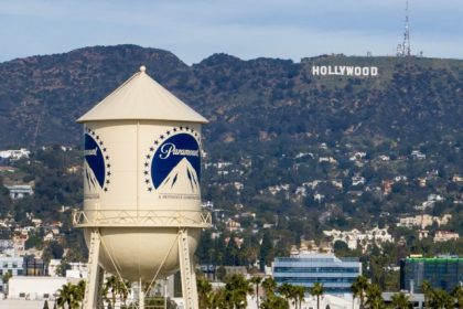 The Paramount Pictures water tower with the Hollywood sign in the distance, in Los Angeles on Dec. 18, 2025. Credit: Photo by Jae C. Hong, AP Photo