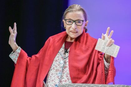September 18. In this Oct. 3, 2019 file photo, U.S. Supreme Court Justice Ruth Bader Ginsburg gestures to students before she speaks at Amherst College in Amherst, Mass. In her last years on the Supreme Court, Justice Ruth Bader Ginsburg moved slowly. She was always the last justice to exit the courtroom, with Justice Clarence Thomas helping her down the steps from the Supreme Court bench. But Ginsburg, who died in September at age 87, was known for her speed at something: writing opinions.  Credit: AP Photo/Jessica Hill