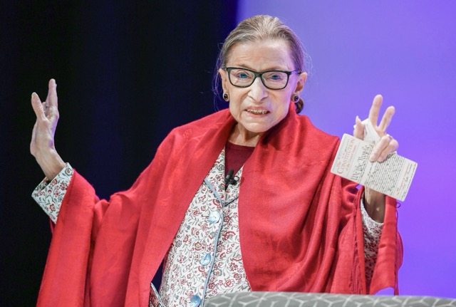 September 18. In this Oct. 3, 2019 file photo, U.S. Supreme Court Justice Ruth Bader Ginsburg gestures to students before she speaks at Amherst College in Amherst, Mass. In her last years on the Supreme Court, Justice Ruth Bader Ginsburg moved slowly. She was always the last justice to exit the courtroom, with Justice Clarence Thomas helping her down the steps from the Supreme Court bench. But Ginsburg, who died in September at age 87, was known for her speed at something: writing opinions. Credit: AP Photo/Jessica Hill