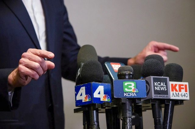 Local News Organizations. Microphones from various news outlets at a press conference in Los Angeles on Sept. 28, 2023. Credit: Photo by Alisha Jucevic for CalMatters