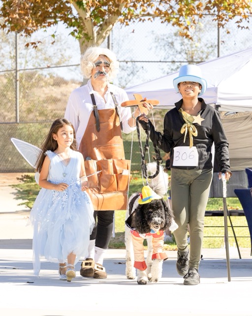 Participants and their pets braved unseasonably warm October heat in full costumes during the annual Dog Daze Canine Festival at Aldergate Dog Park in Menifee on Saturday, October 3.