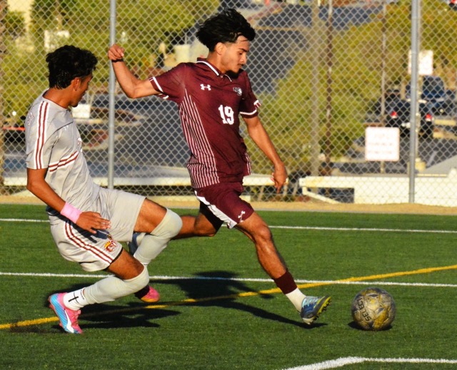 A Victor Valley shot on goal eluded Norco College Goalie Julian Luevanos, but it clanged off the sidebar during the Mustangs 3 – 1 win.  
Cred: Photo by Gary Evans